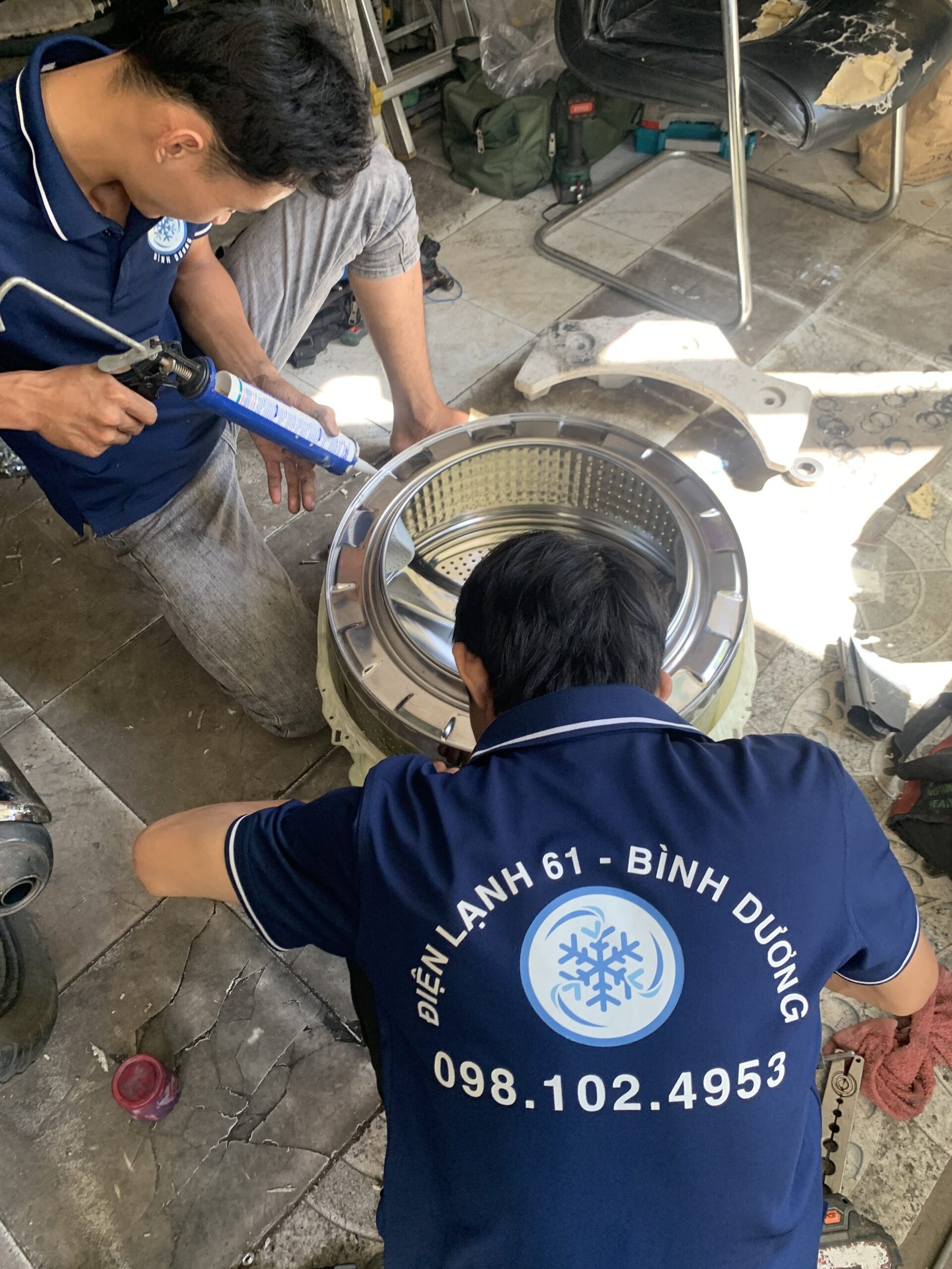 Tháo lồng máy giặt thay chảng ba
