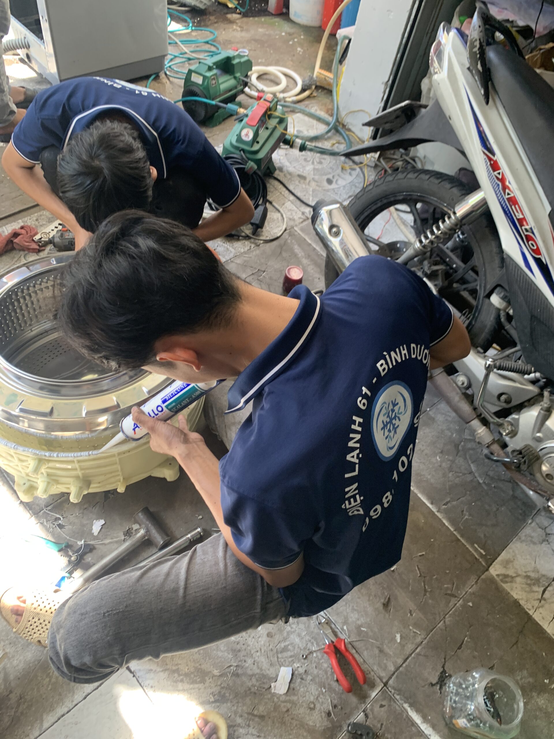 thao-long-may-giat-cua-truoc-binh-hoa Quy trình tháo rời lồng giặt cửa ngang an toàn và đúng kỹ thuật tại Bình Hòa.